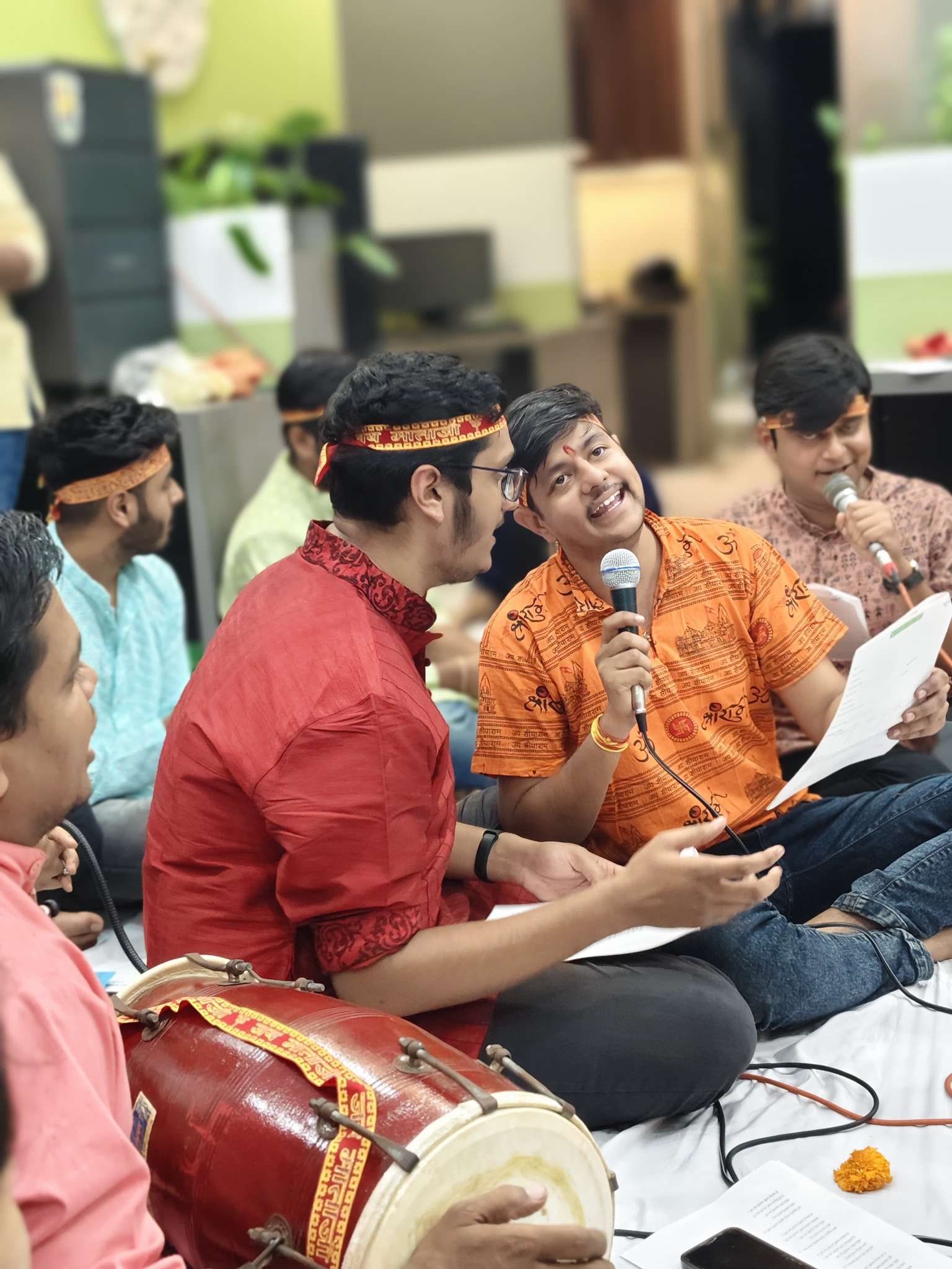 Team members singing devotional songs