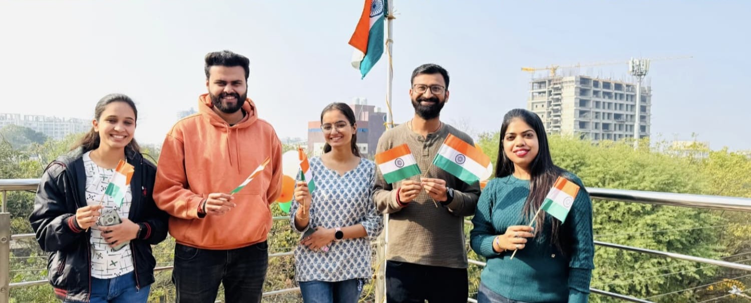 Team members holding flags
