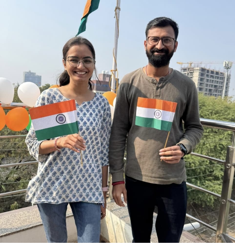 Team members holding flags
